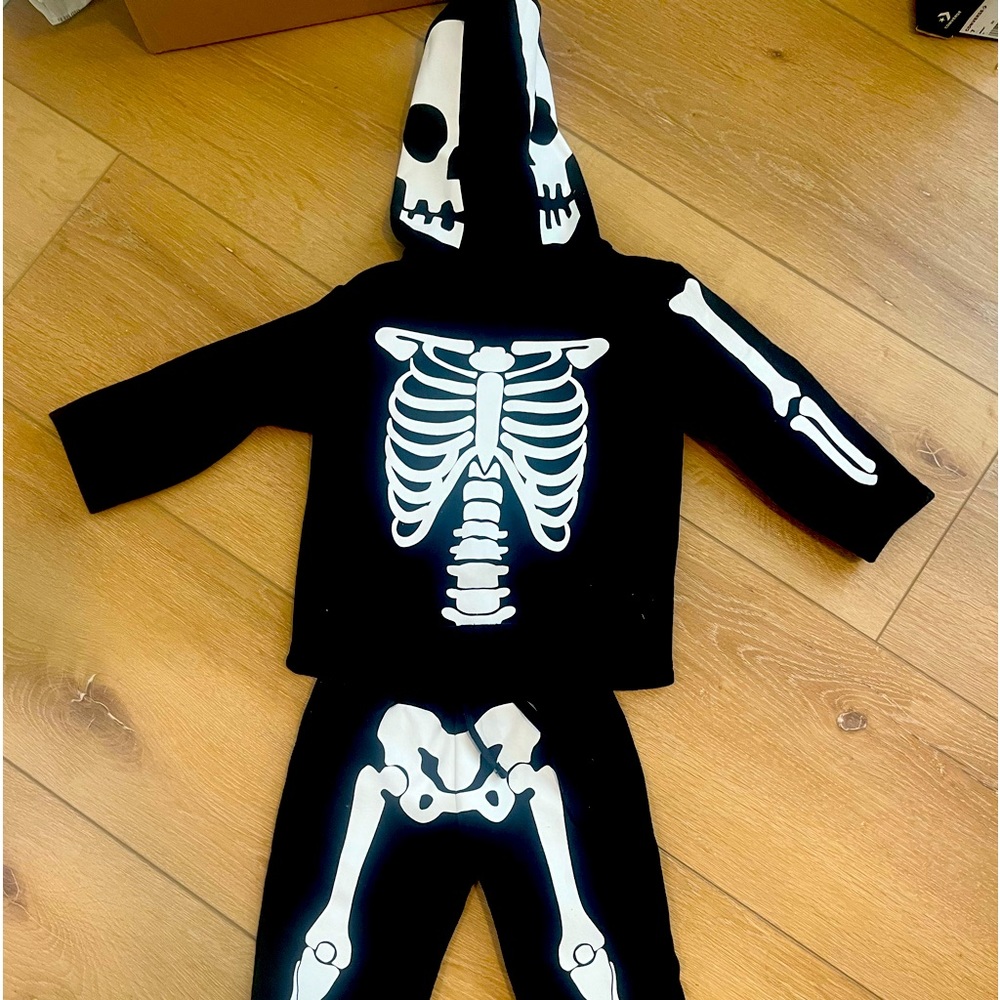 H&M skeleton sweatshirt and pants. Worn once. Excellent condition.